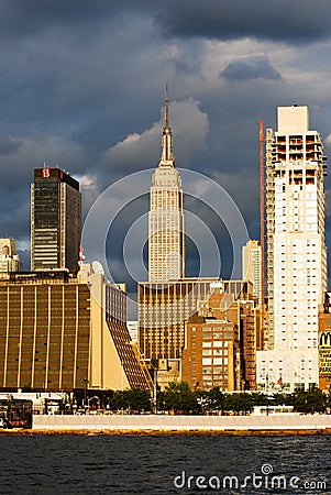 Manhattan Skyline with Empire State Building over Hudson River, NYC.