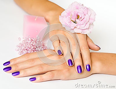 Manicure, flower, candle and beads