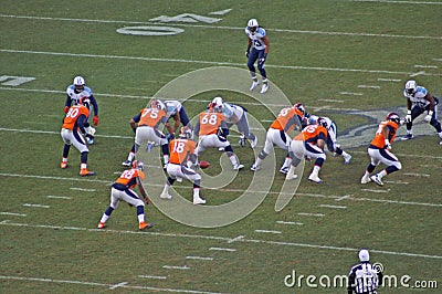 Manning takes the snap