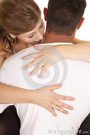 Mans back woman close kiss neck