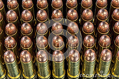 Many bullets for a pistol with copper tips