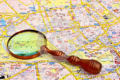 Map of London and magnifier glass.