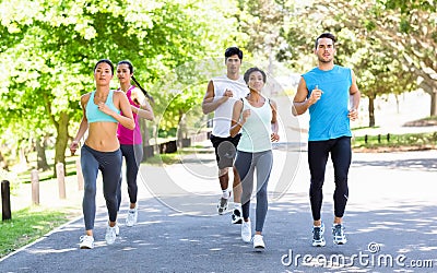 Marathon athletes running on street