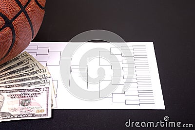 March Madness Bracket Basketball and Fanned Money on Black