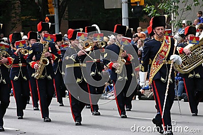 Marching brass band and drum major