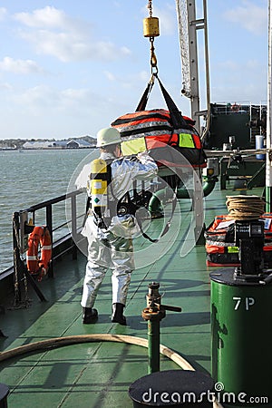 Marine firefighters in breathing apparatus