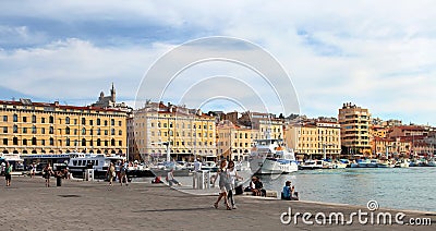 MARSEILLE - JULY 2, 2014: Old port (Vieux-Port) with people walk