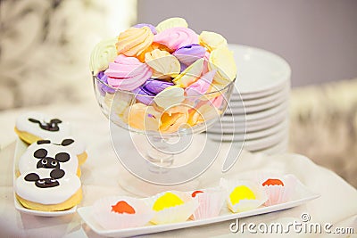 Marshmallows and other sweets on a party table