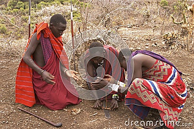 Masai warriors lighting fire