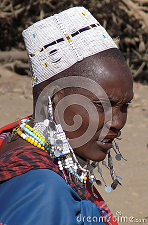 Masai woman in beaded hat and jewelry
