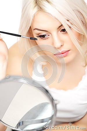 Mascara Applying. Woman applying mascara on eyelashes. Eye Makeup