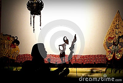 A master (puppeteer) of Javanese shadow puppet