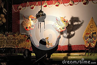 A master (puppeteer) of Javanese shadow puppet