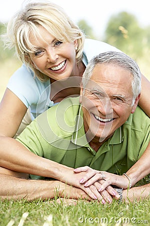 http://thumbs.dreamstime.com/x/mature-couple-having-fun-countryside-10972062.jpg