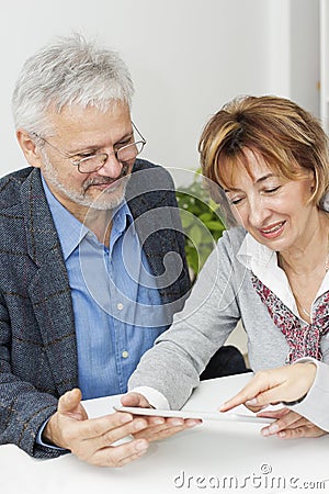 Mature Couple in Meeting With Financial Advisor