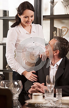 http://thumbs.dreamstime.com/x/mature-couple-restaurant-cheerful-middle-aged-looking-each-other-32905033.jpg