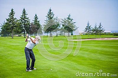 Mature Golfer on a Golf Course