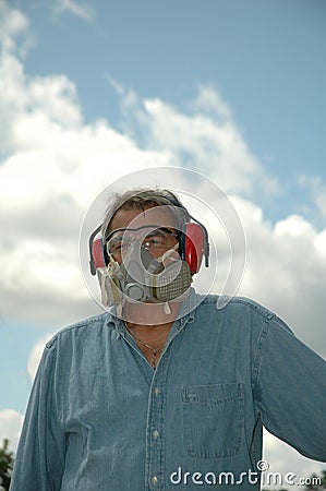 Mature Man wearing safety gear.