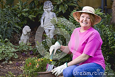 Mature woman gardening.