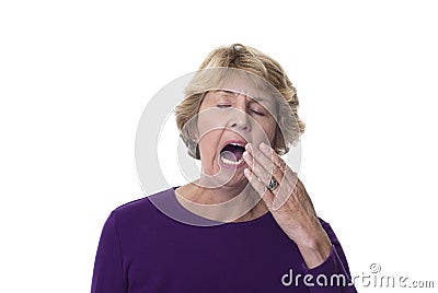 Mature woman yawning