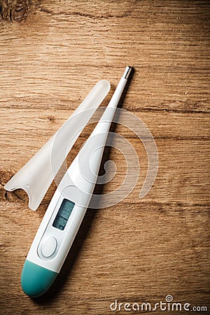 Medical background. Electronic thermometer.