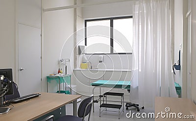 Medical room services with furniture and bed.