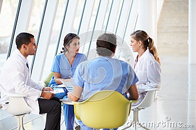 Medical Team Meeting Around Table