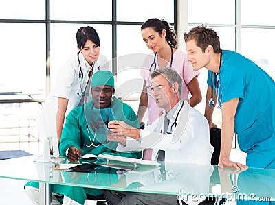 Medical team studying an X-ray