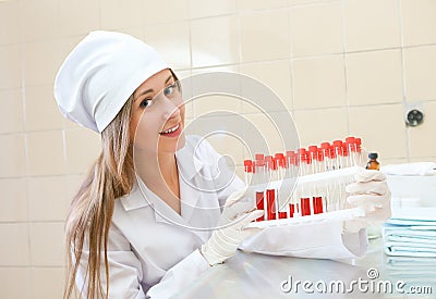 Medical worker with tubes blood tests