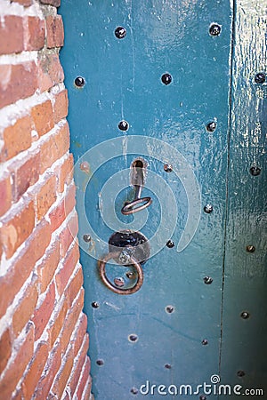 Medieval door with keyhole and key
