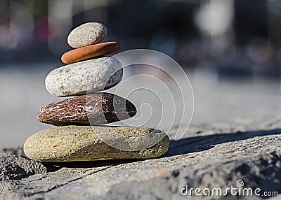 Mediteranian Stones Balanced on The Beach of Nice under rocks.