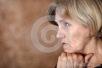 Melancholy older woman