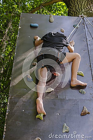 Men climbing on a wall