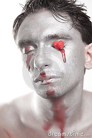  Makeup on Face Of Young Men In Silver Makeup With Bruises And Symbol Of Heart