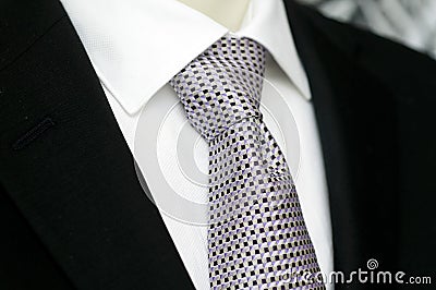 Mens black suit and sharp looking tie
