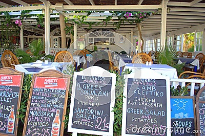 Menus at seaside restaurant ,Santorini,Greece