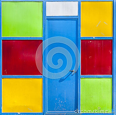 Metal door in colored panels
