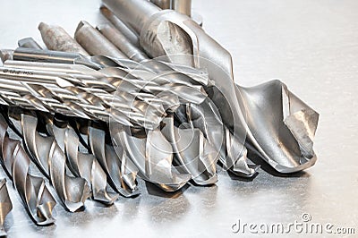 Metal drill bits. Drilling and milling industry. Closeup.