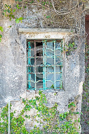 Metal window frame on a old house