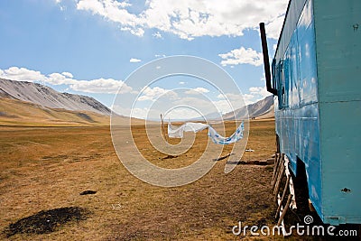Metallic caravan of nomads between the mountaines