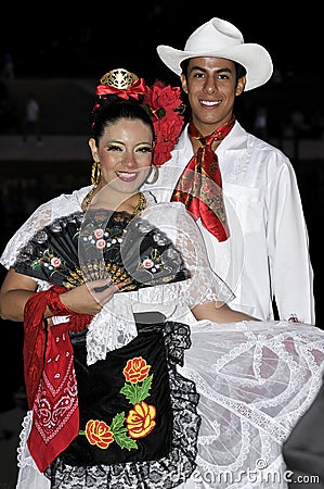 Mexico young boy and lady, folklore dancers