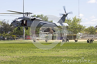 MH-60S helicopter from Helicopter Sea Combat Squadron Five with US Navy EOD team landing for mine countermeasures demonstration