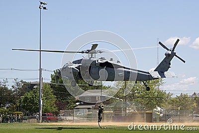 MH-60S helicopter from Helicopter Sea Combat Squadron Five with US Navy EOD team landing for mine countermeasures demonstration