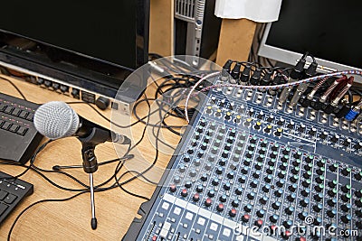 Microphone and sound mixing equipment at television studio