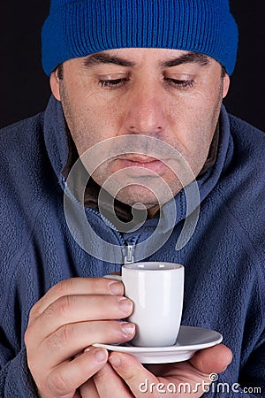 Middle age men having cup of coffee