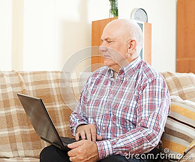Middle-aged man with laptop