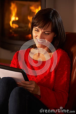 Middle Aged Woman Using Tablet Computer