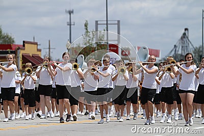 Middle School Band flutes in parade in small town America