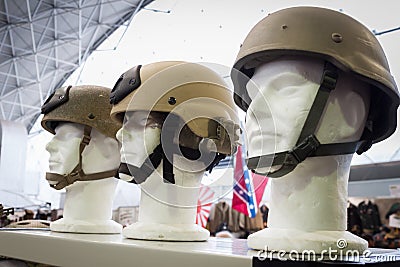 Military helmets at Militalia 2013 in Milan, Italy