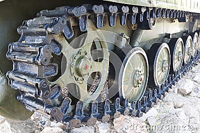 Military vehicles running gear on tracks